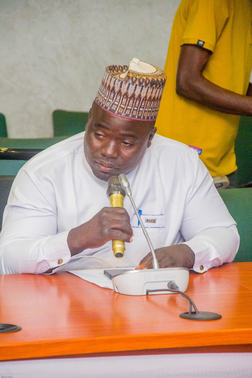 A stakeholder taking notes during the meeting