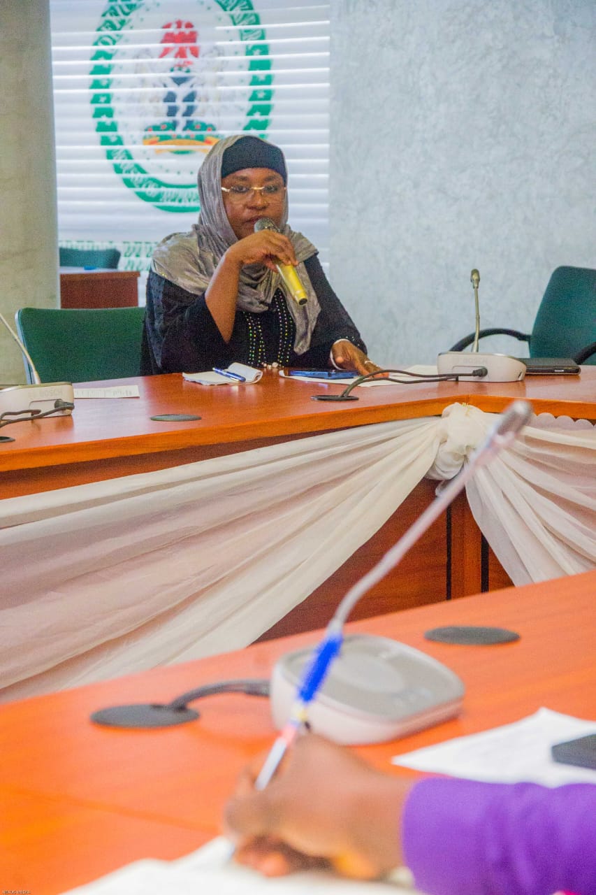 A delegate reviewing meeting documents